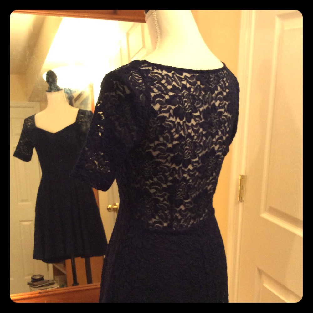 Stunning navy blue lace dress from Anthropologie